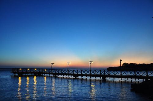 Steiger Pirate Bay, Curaçao, ondergaande zon