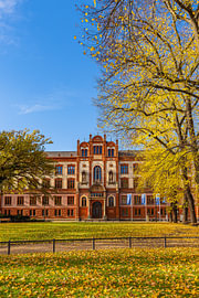 A view of the university in the Hanseatic city of Rostock in autumn by Rico Ködder