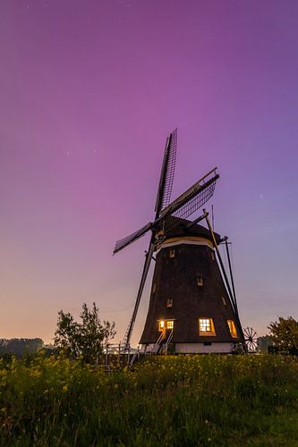 Northern lights in Dutch landscape (mill) by Lisa Groothuis