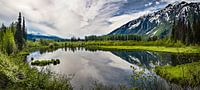 Panorama of reflective mountain lake, Canada by Rietje Bulthuis thumbnail