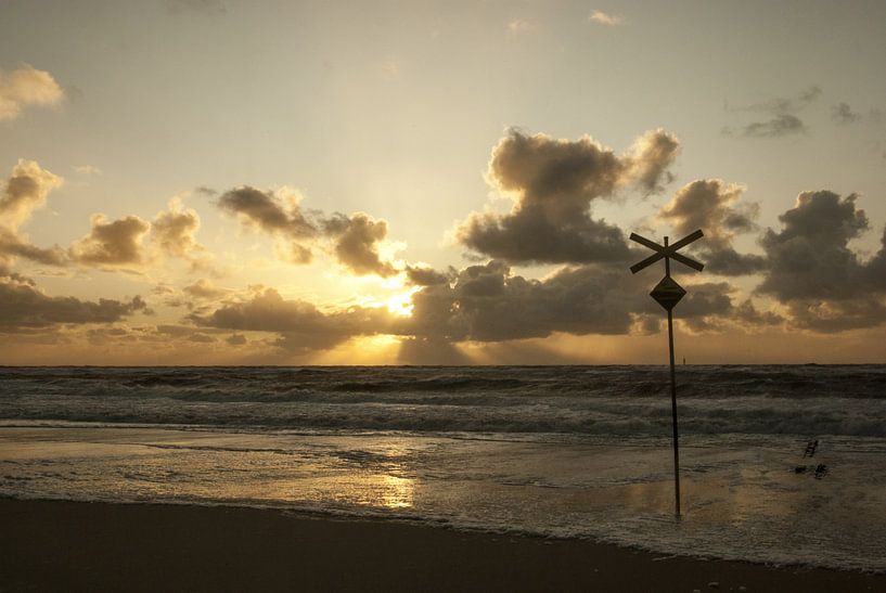 Danger signs on the beach by Norbert Sülzner