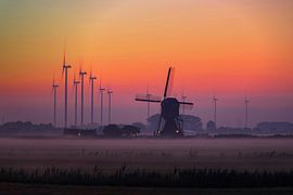 Windmill at Hellouw with a rising sun by Rob Jansen