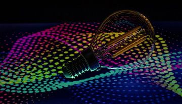 Colourful light bulb by Connie de Graaf