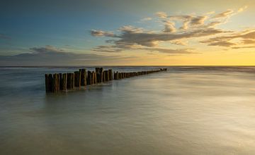 palen bij zonsondergang van peterheinspictures