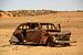 Autowrak in de woestijn van Antwan Janssen