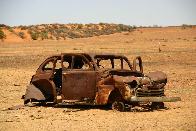Car wreck in the desert by Antwan Janssen