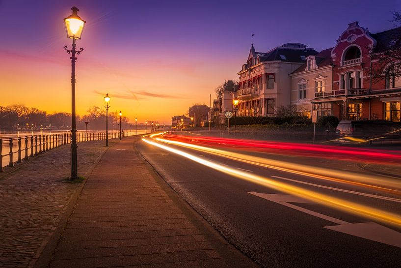 The Welle with traffic in Deventer with lampposts in purple. by Bart Ros