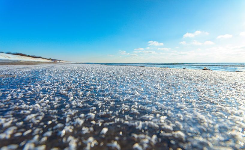 Surface texture of the frozen beach by Yevgen Belich