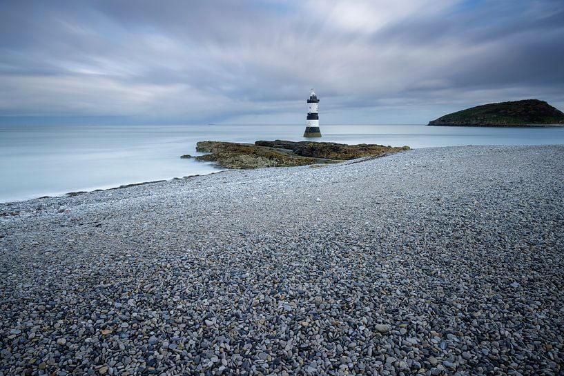 Lighthouse on pebble beach by Johan Cusseneers