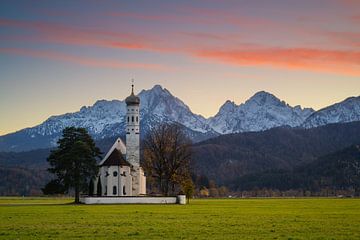 Evening glow at St. Coloman's Church in Bavaria by Raoul Baart
