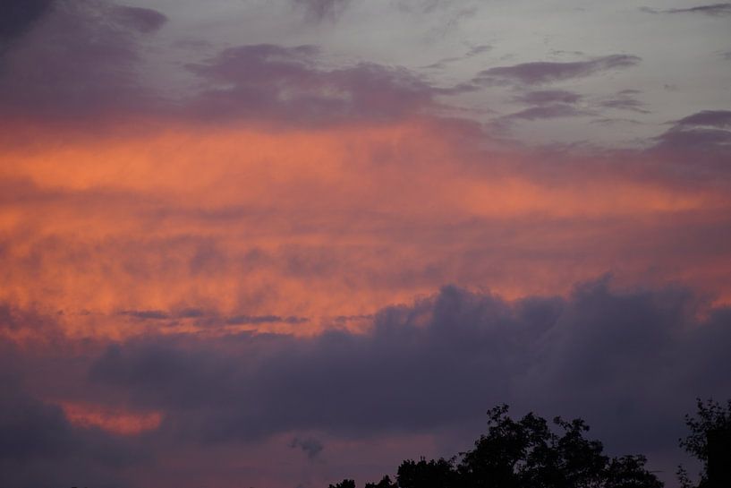 Fire clouds at sunset by foto's van gijs