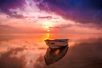 Rowing boat in a colorful sunset