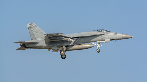 A US Navy Boeing F/A-18E Super Hornet landing.