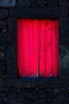 Wooden window shutters lava wall by Jan Brons