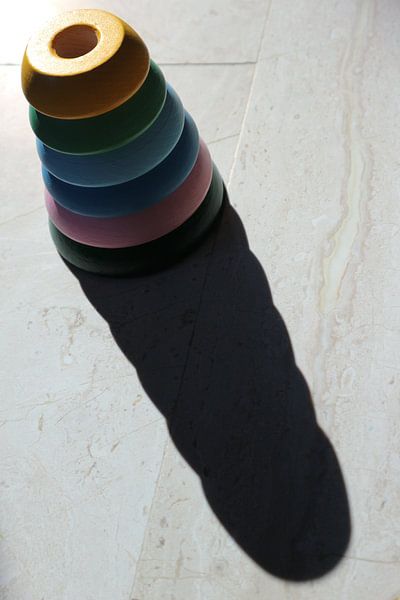 Toy discs on top of each other with shadow by hou2use