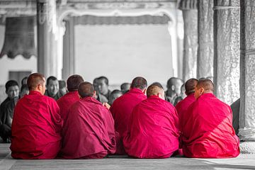 Sitting Tibetan monks by Jack Donker