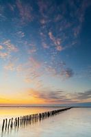 Driving dams at sunset