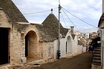 Trulli cottages in Alberolbello, Italy by Henk Langerak