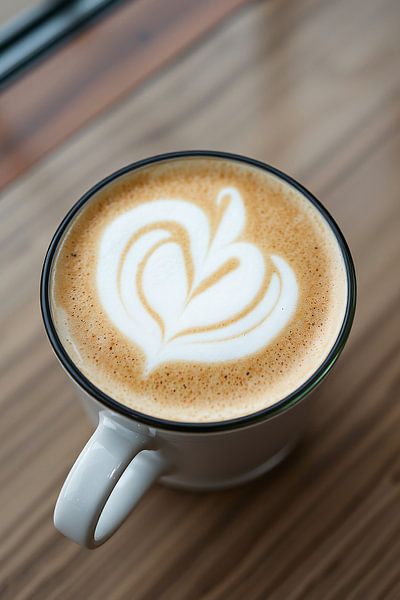 A cup of cappuccino by Wandbilder-Shop
