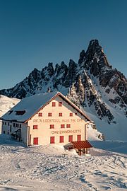 Drei zinnen hut and Paternkofel in the evening light in winter
