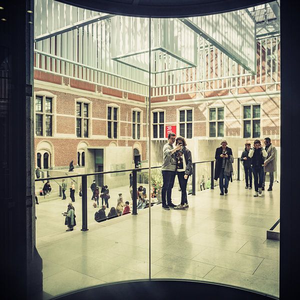 Visitors at the Stedelijk Museum in Amsterdam taking a selfie. by Elmar Keijzer