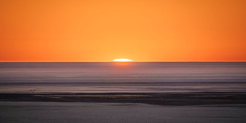 Lever de soleil sur un pan de sel par Marco Schmierl