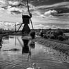 Hollands landschap met molen van Tom Oosthout