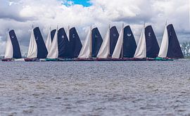 Skûtsje sailing in Friesland during Sneekweek by Brian Morgan