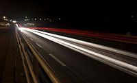 Lichtstralen over autoweg.