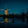 Verlichtte molen bij ophaalbrug van Henri van Avezaath