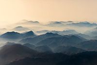 morning sun over misty mountains