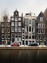 Kanal und alte Häuser in Amsterdam, Niederlande. von Lorena Cirstea Miniaturansicht