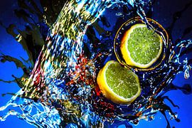 Lemons in the water jet by Photoart-Naegele