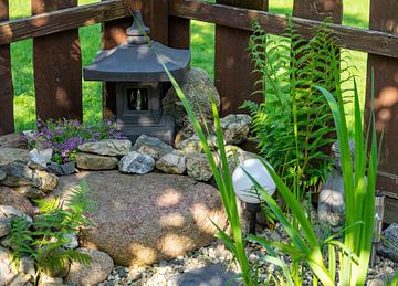 Japanese garden with temple and stones by Animaflora PicsStock