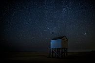 Little shipwreck shelter under a starry sky at the isle of Terschelling by Maurice Haak thumbnail