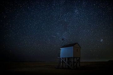 Little shipwreck shelter under a starry sky at the isle of Terschelling