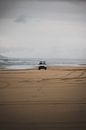 Jeep on the beach in Hat Head National Park Australia by Ken Tempelers thumbnail