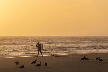 Fischer bei Sonnenuntergang