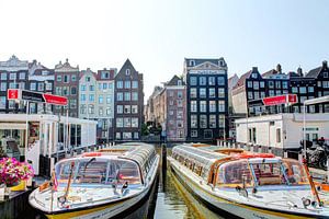 Damrak Amsterdam mit Kanalbooten