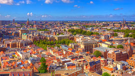 The skyline of The Hague, featuring the Binnenhof, the Peace Palace and the Grote Kerk, with Scheveningen in the background