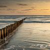 Sunset on the beach of Ameland by Ron Buist