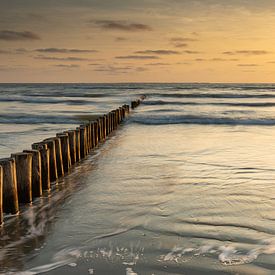 Sunset on the beach of Ameland by Ron Buist