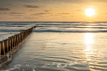 Coucher de soleil sur la plage d'Ameland