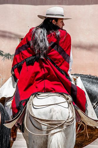 Fire of the Pampas - Female gaucho on horseback, Argentina