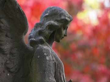 Angel with autumn colored background by Edwin Butter