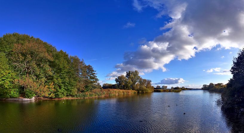 Panorama at the lake with reflection in the calm water by MPfoto71