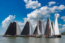 Pushing to go around the buoy at Skûtsjesilen by Johan Swaneveld