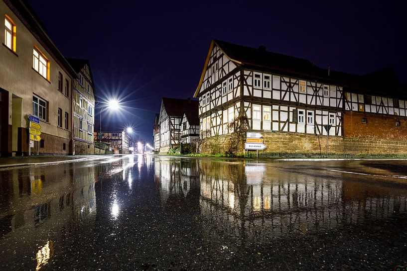 Herleshausen in the mirror of the street by Roland Brack