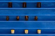 Blue racks with jars of honey at Agios Ioannis Monastery on Kos by Steven Dijkshoorn thumbnail