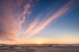 Colourful sunset on the beach of Zeeland by Peter Haastrecht, van